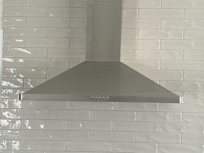 36” Stainless Rangehood with Desert Glossy Tile Backsplash